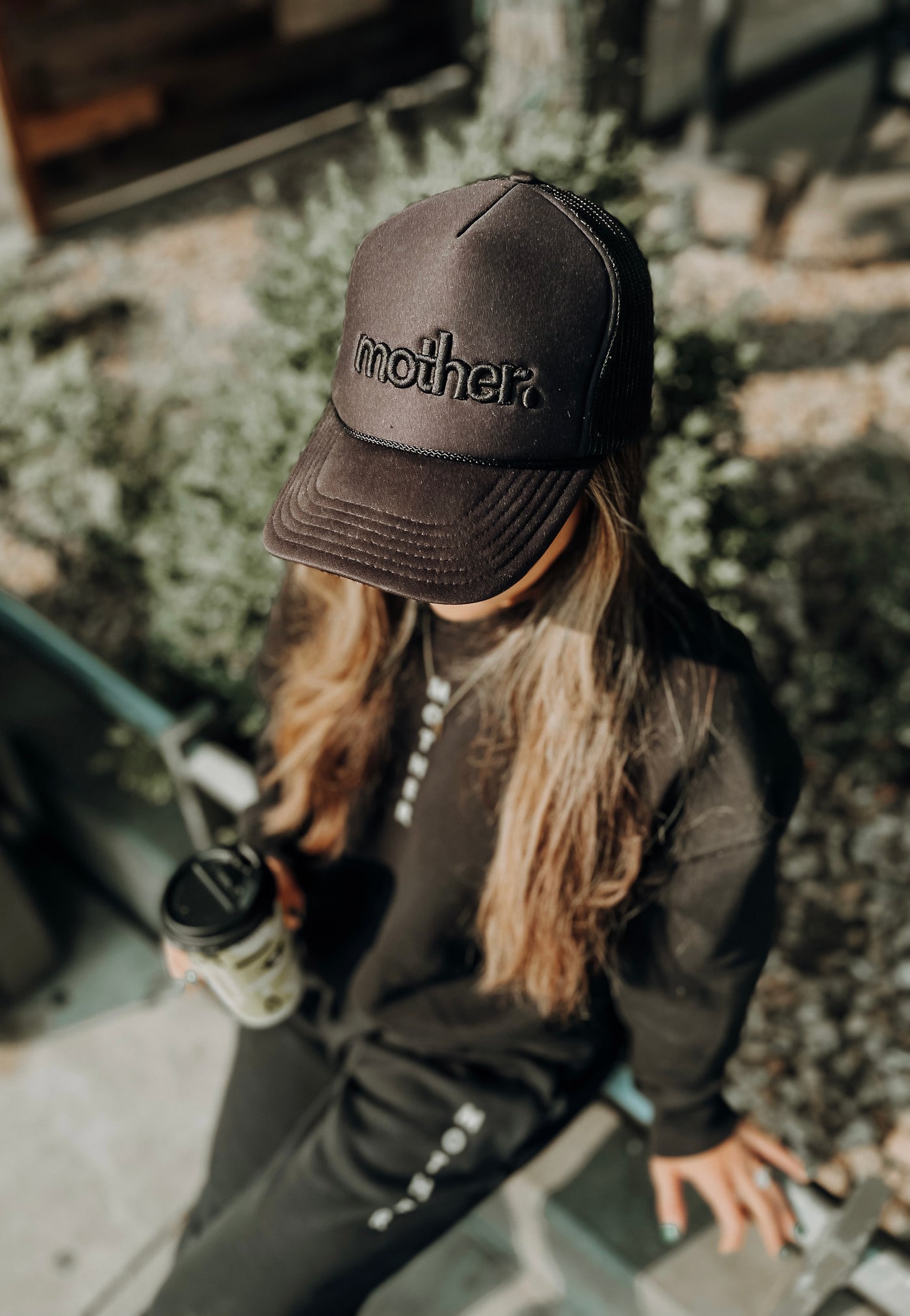 "mother." Embroidered Trucker Hat - Black on Black